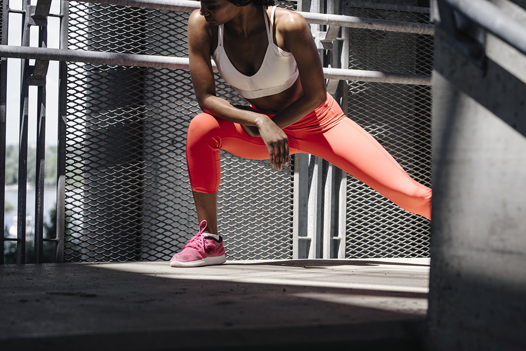 thigh exercises - woman doing side lunges