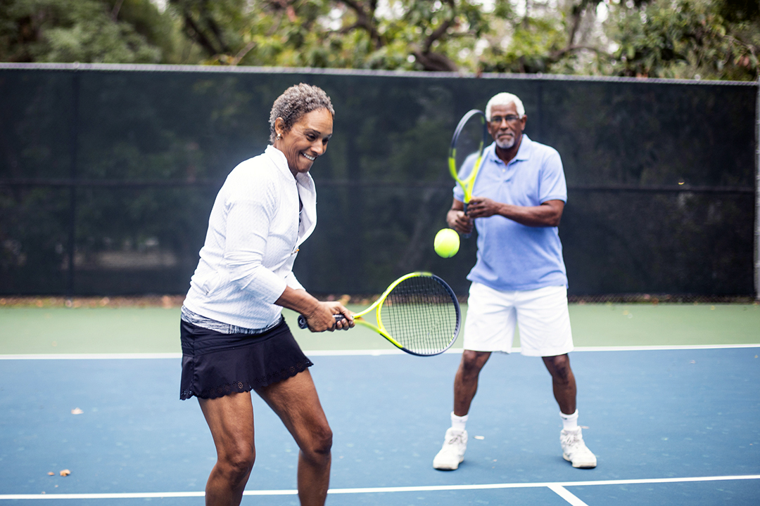 thigh exercises - senior couple playing tennis