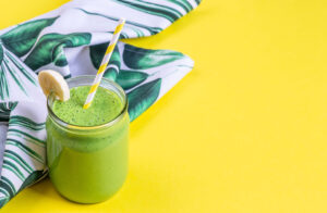 Green spinach smoothies in jar with chia seeds - AlignLife Healthy Recipes