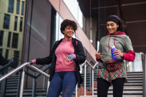 two women walking in the city for exercise