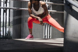 woman doing a side lunge