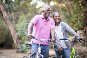 senior couple riding bikes