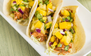 hawaiian bbq tacos with pineapple garnish