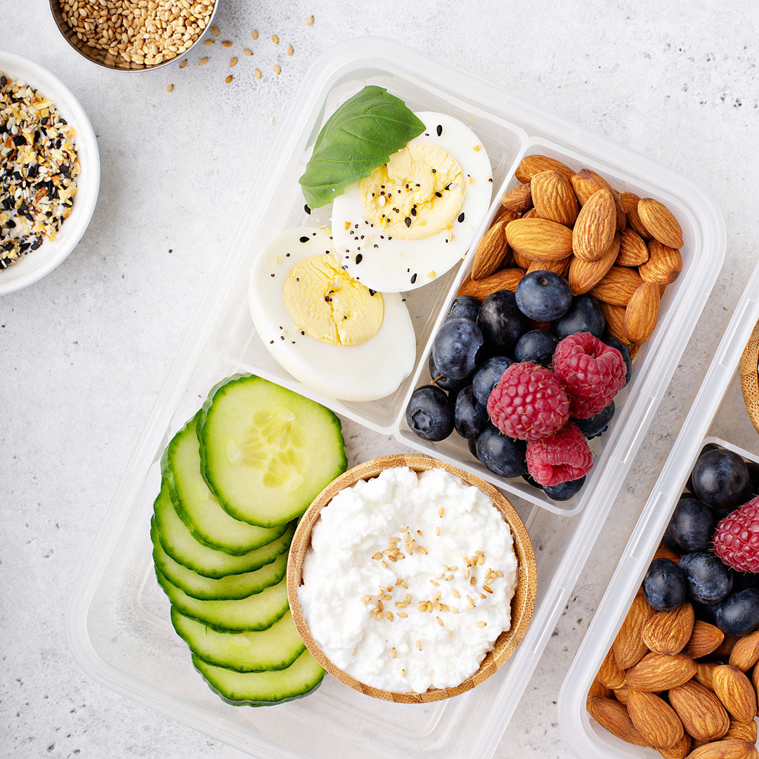 healthy snacks, Lunch or snack box with high protein food, cottage cheese, nuts and eggs