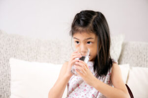 little girl drinking water