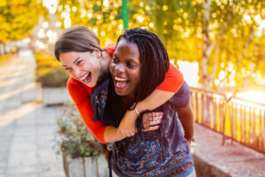 women's heart health - two diverse women happy