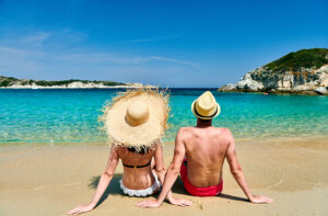 Couple on beach in Greece