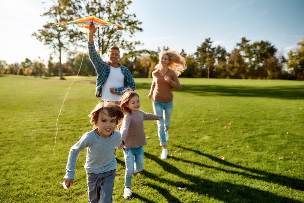 family flying kite