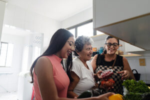 group of women making healthy choices in kitchen - detoxing - ultimate body cleanse