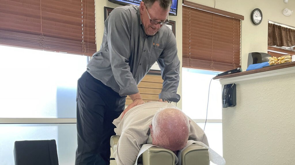AlignLife Ocala West Dr. Renny Edelson Adjusting a Patient