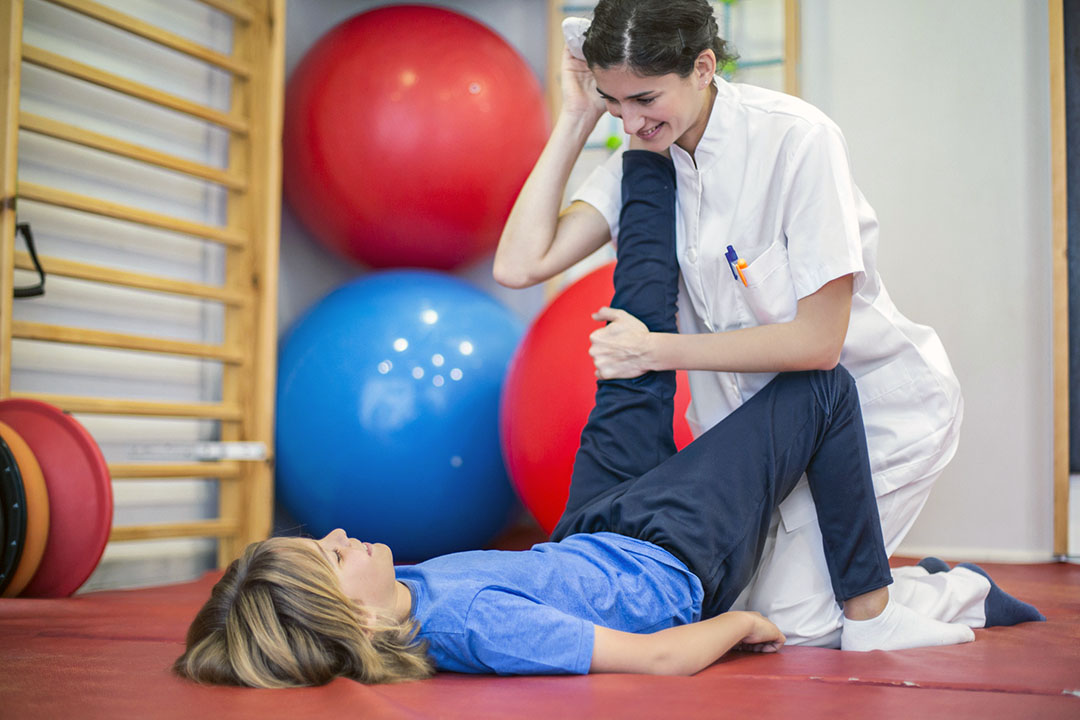 teen girl doing rehab from a sports injury - importance of back to school physical