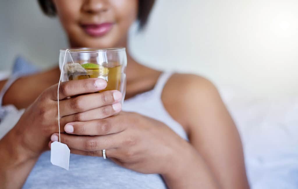 woman drinking green tea