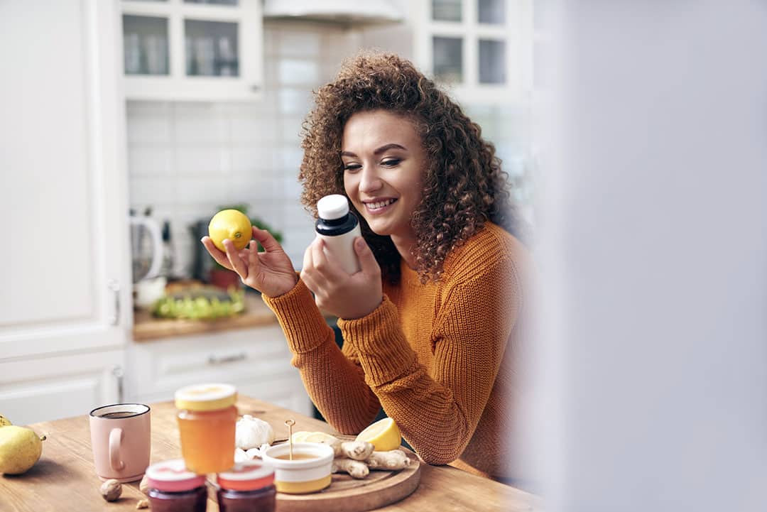 Woman choosing best natural solution for common cold relief