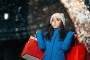 Woman Exhausted from Shopping and Holiday Stress