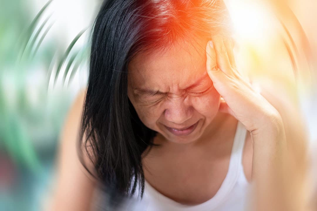 Woman dealing with headache pain