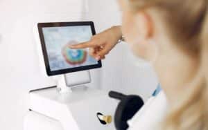 Woman looking at body scan results