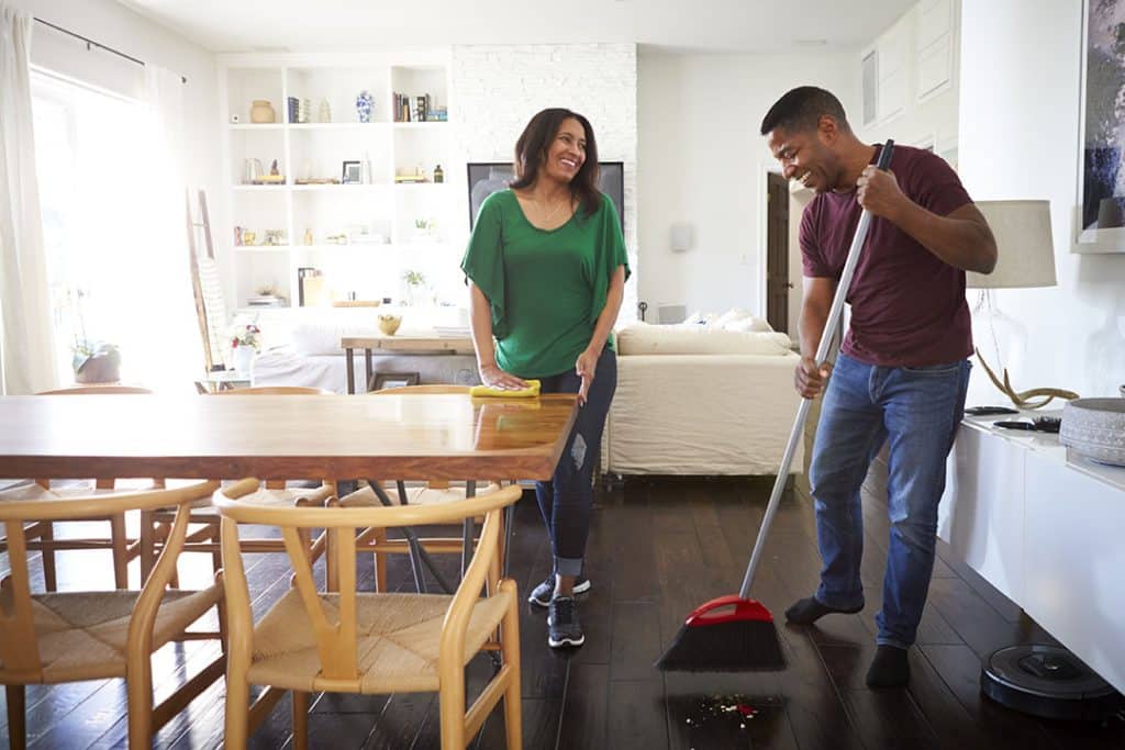 couple spring cleaning house - fun things to do with your partner or spouse