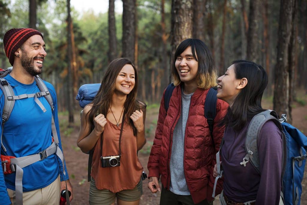 hiking in a forest - fun things to do with friends