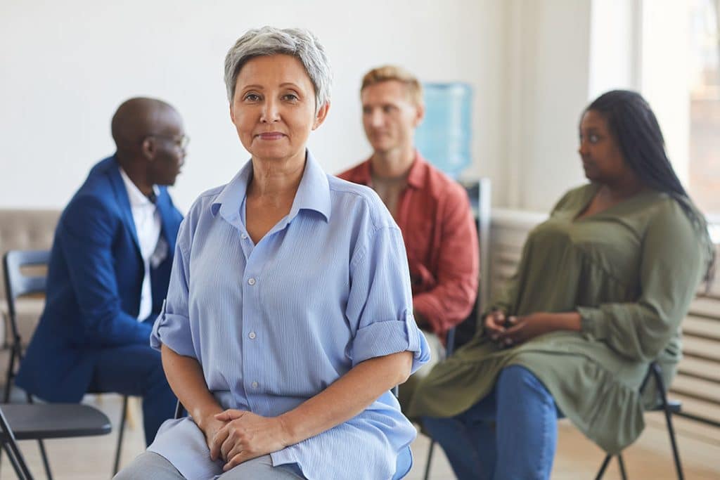 Senior woman with good posture at chiropractor