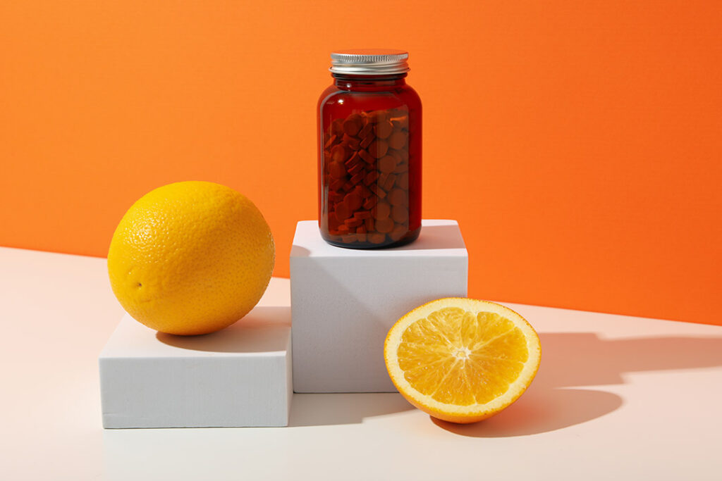 Vitamin C in a bottle in the form of tablets.