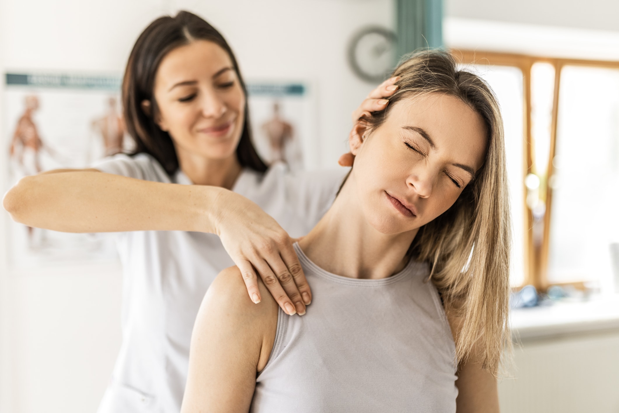 Young woman at chiropractor - Chiropractic Care for Stress