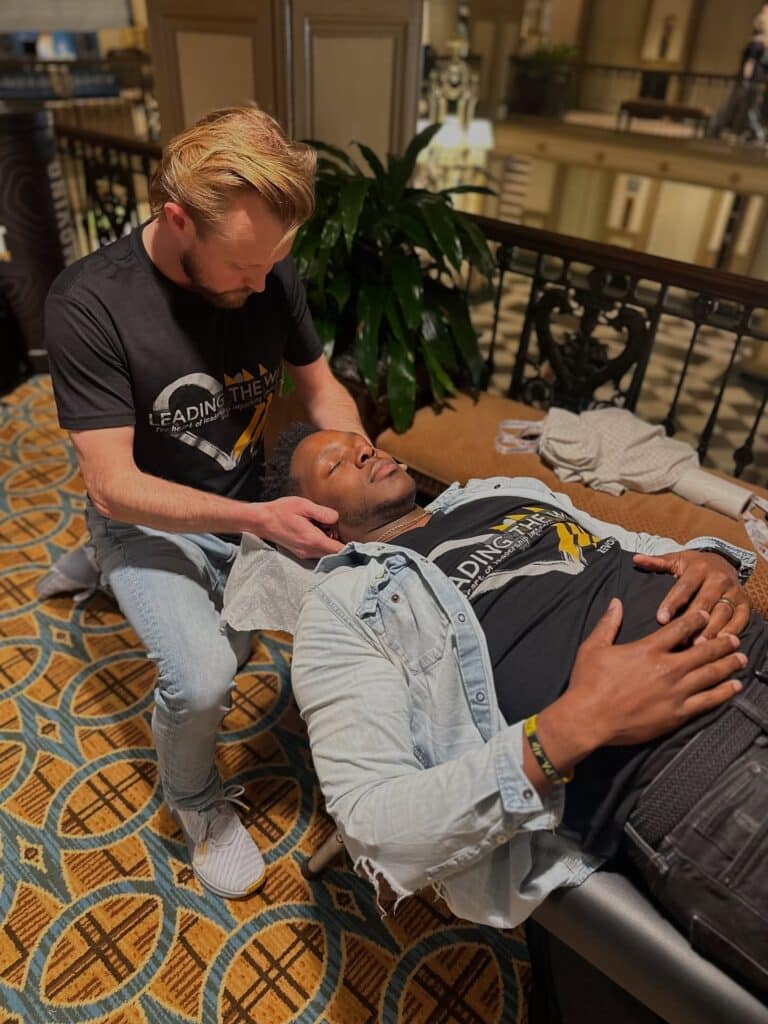 Dr. Raymond Nichols getting a chiropractic adjustment by AlignLife Springfield, IL Chiropractor Dr. Bryne Willey at AlignLife Revolution