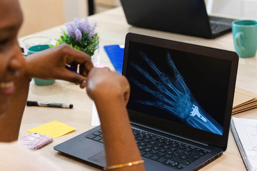 Doctor reviewing wrist x-ray